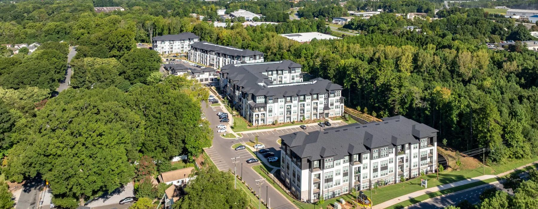 a large building surrounded by trees