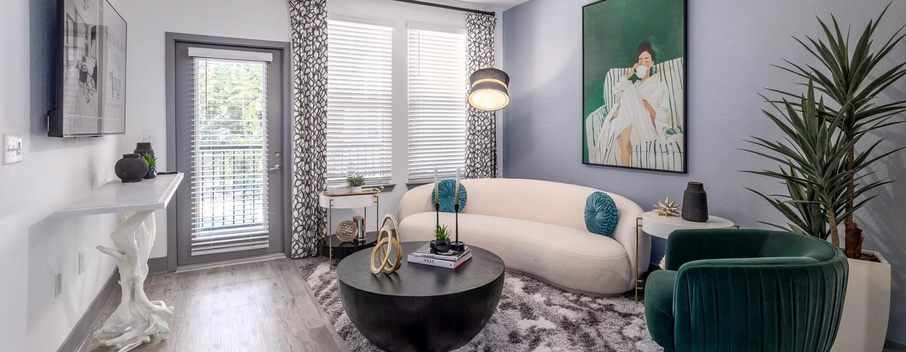 a living room with a tv seating and a table