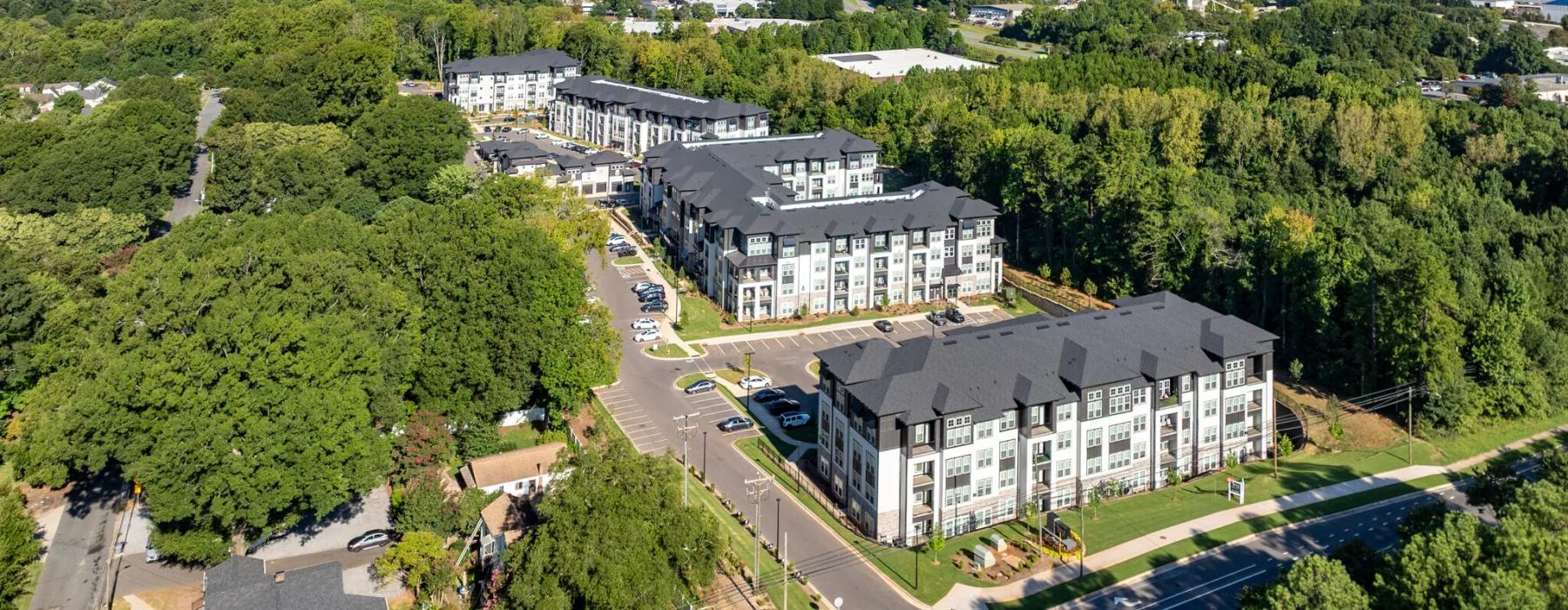 a large building surrounded by trees